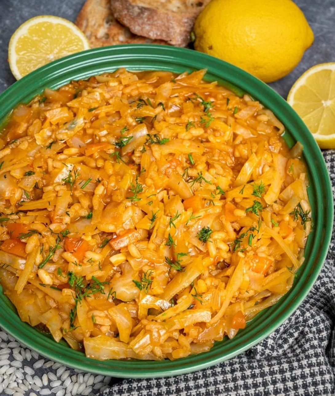 Lahanorizo Cabbage Rice served in a bowl with fresh herbs