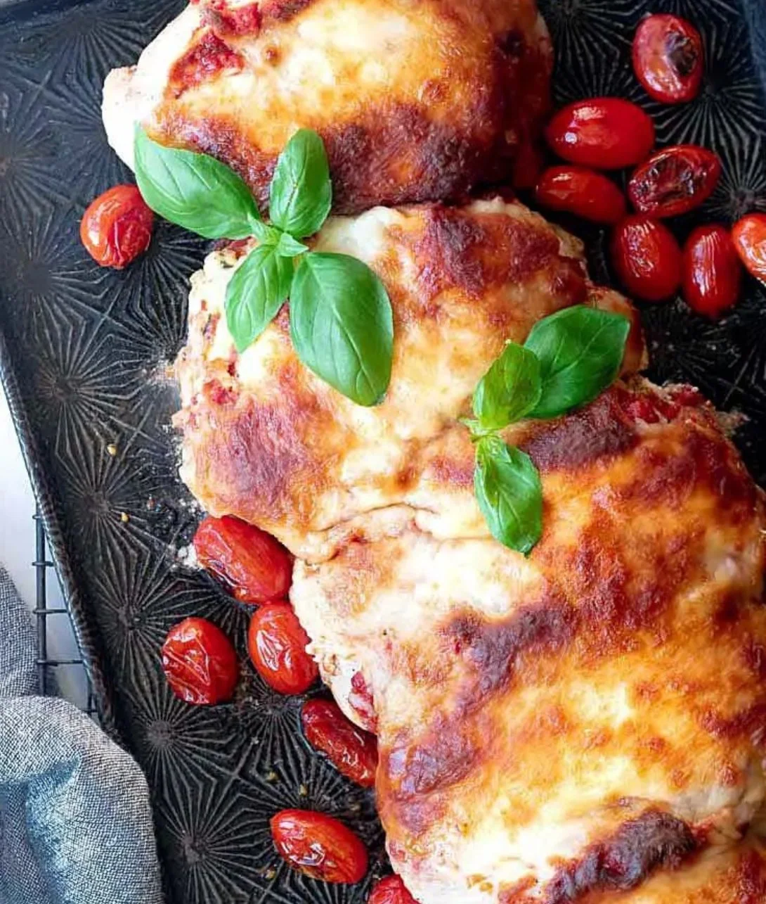 Delicious lasagna stuffed chicken ready to be served on a plate