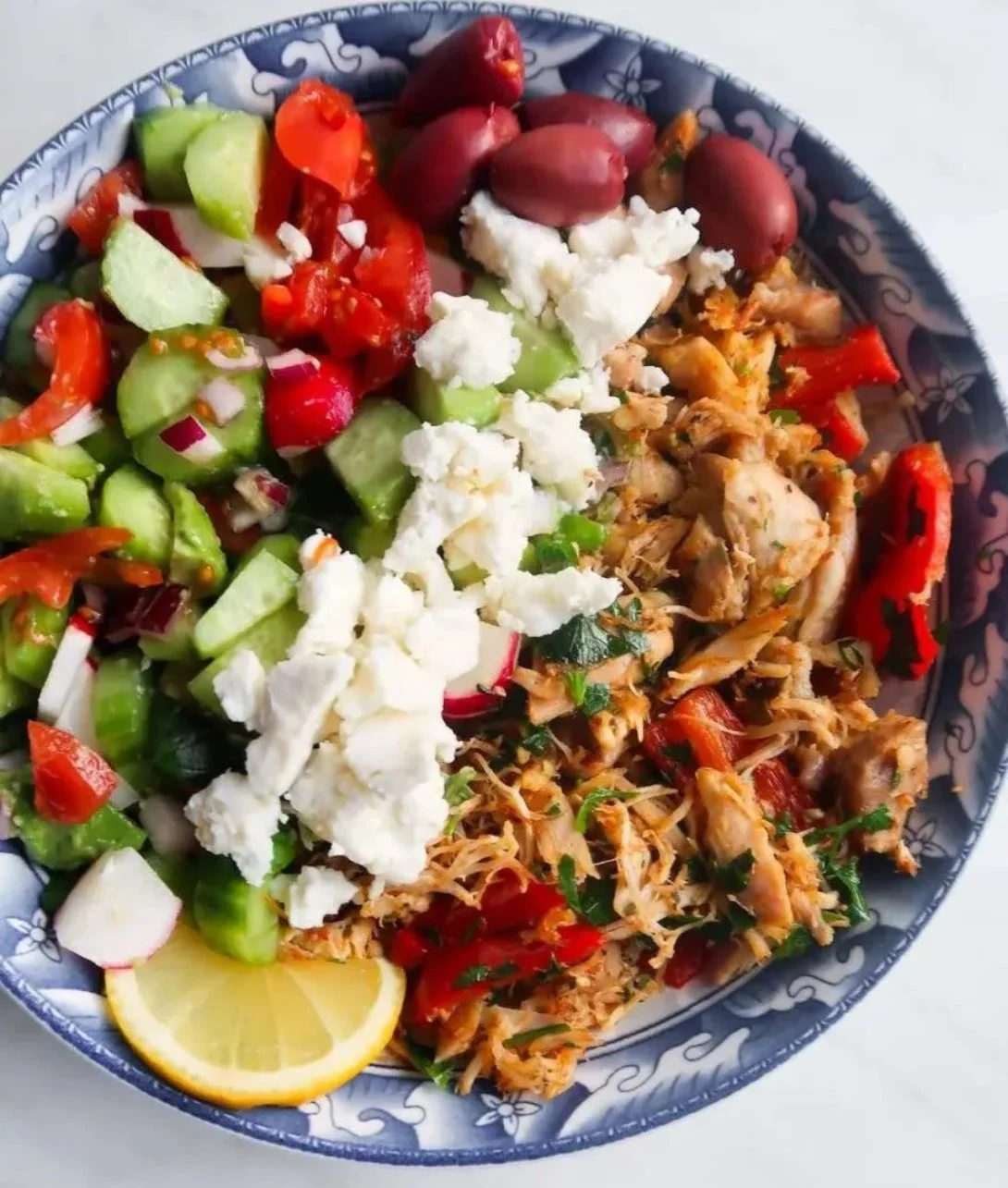 Delicious leftover chicken gyros bowls topped with fresh ingredients