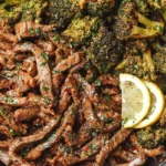 Lemon Garlic Steak cooked with broccoli in a skillet