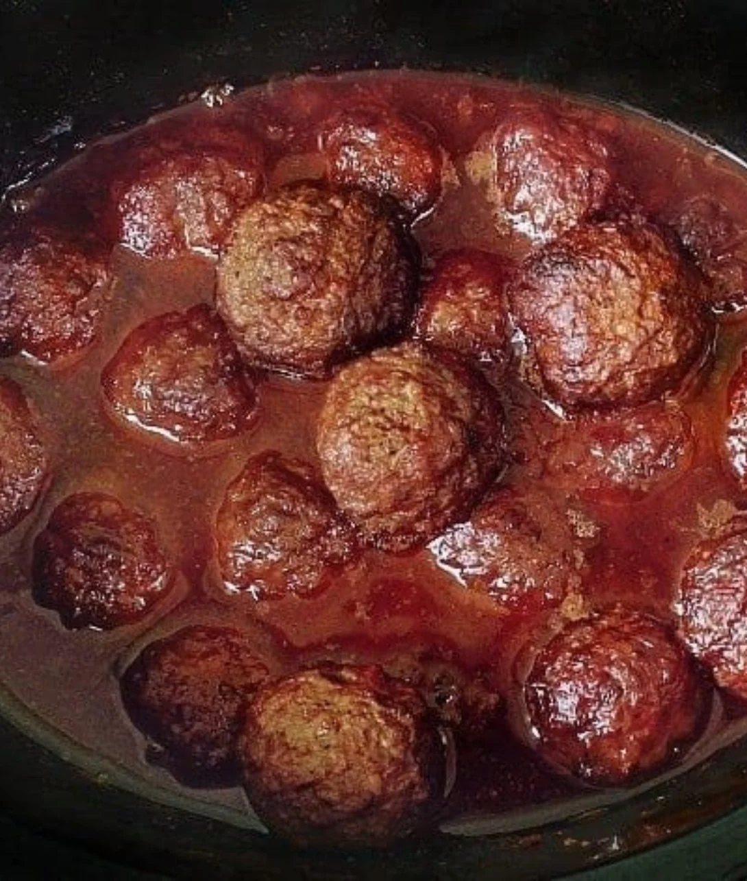 Plate of low carb slow cooker meatballs served with sauce