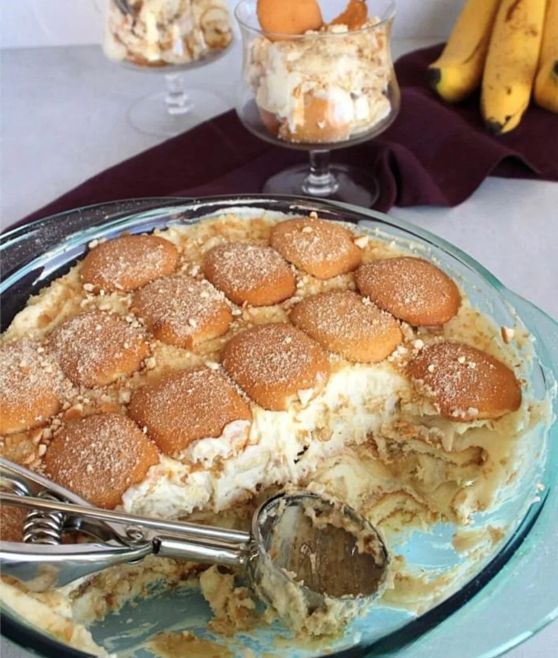 Delicious Magnolia Bakery banana pudding in a clear dish topped with vanilla wafers