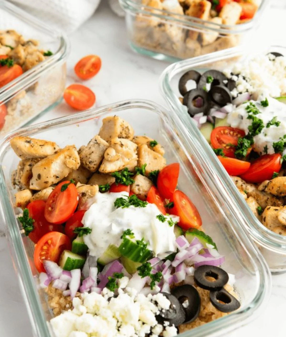 Mediterranean Chicken Quinoa Bowl with fresh vegetables and herbs