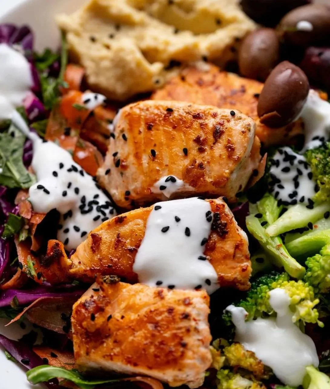 Mediterranean Salmon Bowl with fresh vegetables and grains