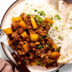 Delicious Mexican Picadillo made with beef and potatoes served in a bowl