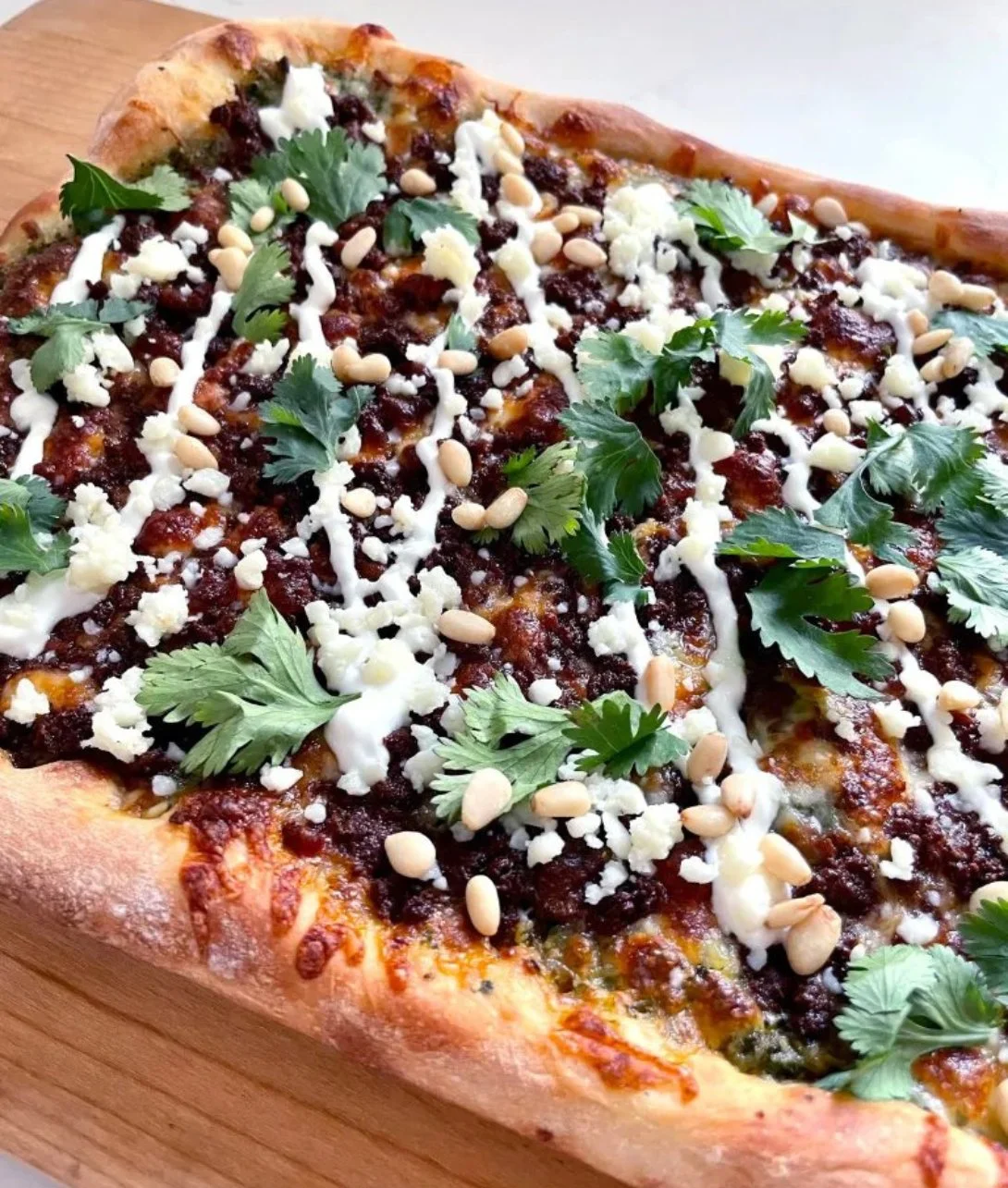 Delicious Mexican Pizza topped with fresh ingredients and spices.