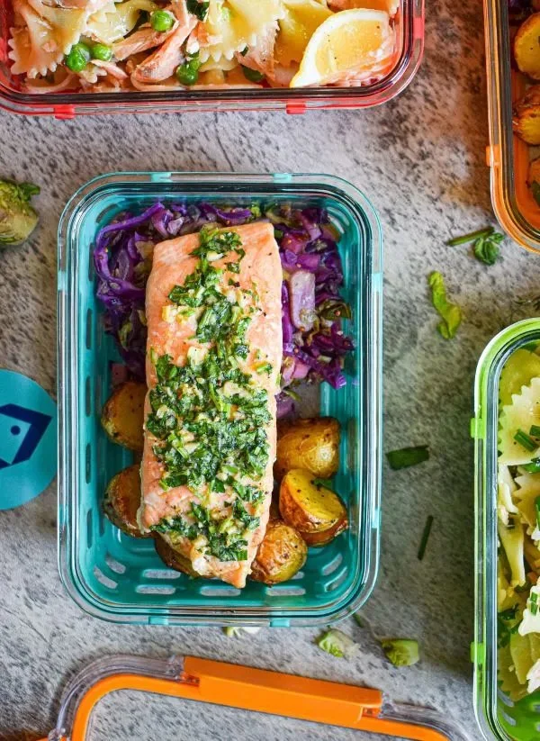 Delicious oven roasted salmon garnished with fresh herbs