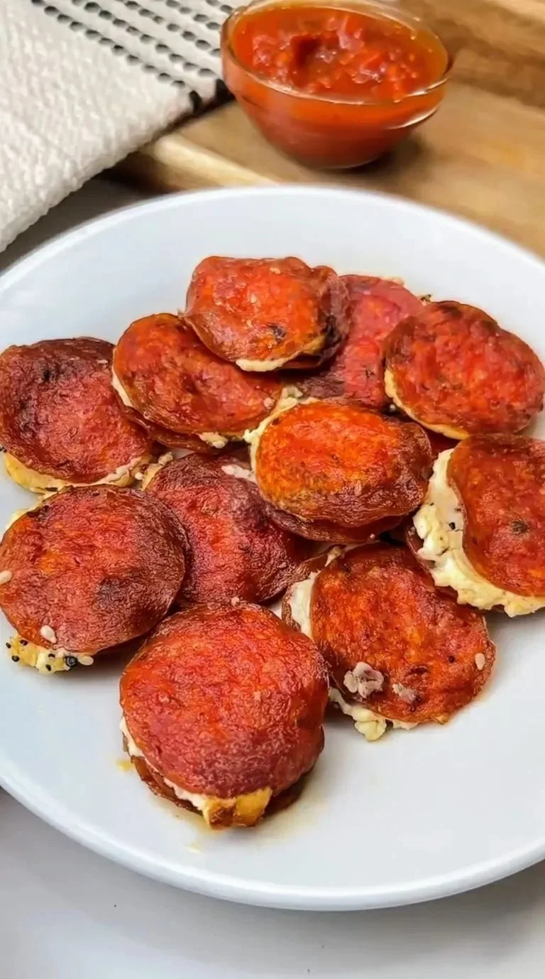 Savory pepperoni pockets filled with cheese and spices, perfect for snacks.