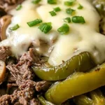 Delicious Philly cheesesteak bowls filled with beef, cheese, and colorful veggies