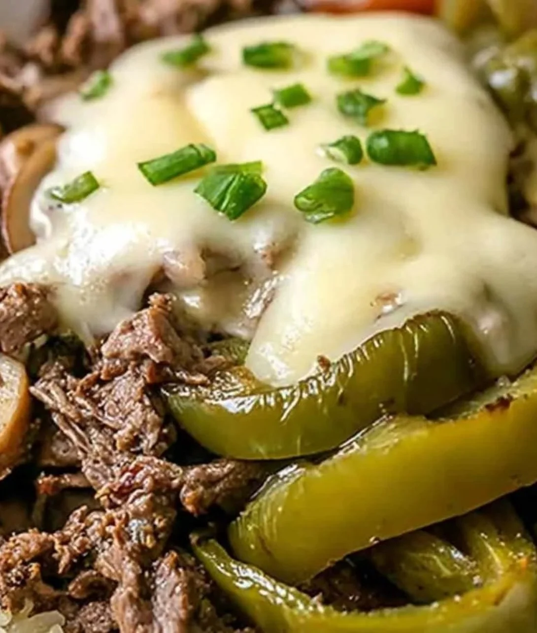 Delicious Philly cheesesteak bowls filled with beef, cheese, and colorful veggies