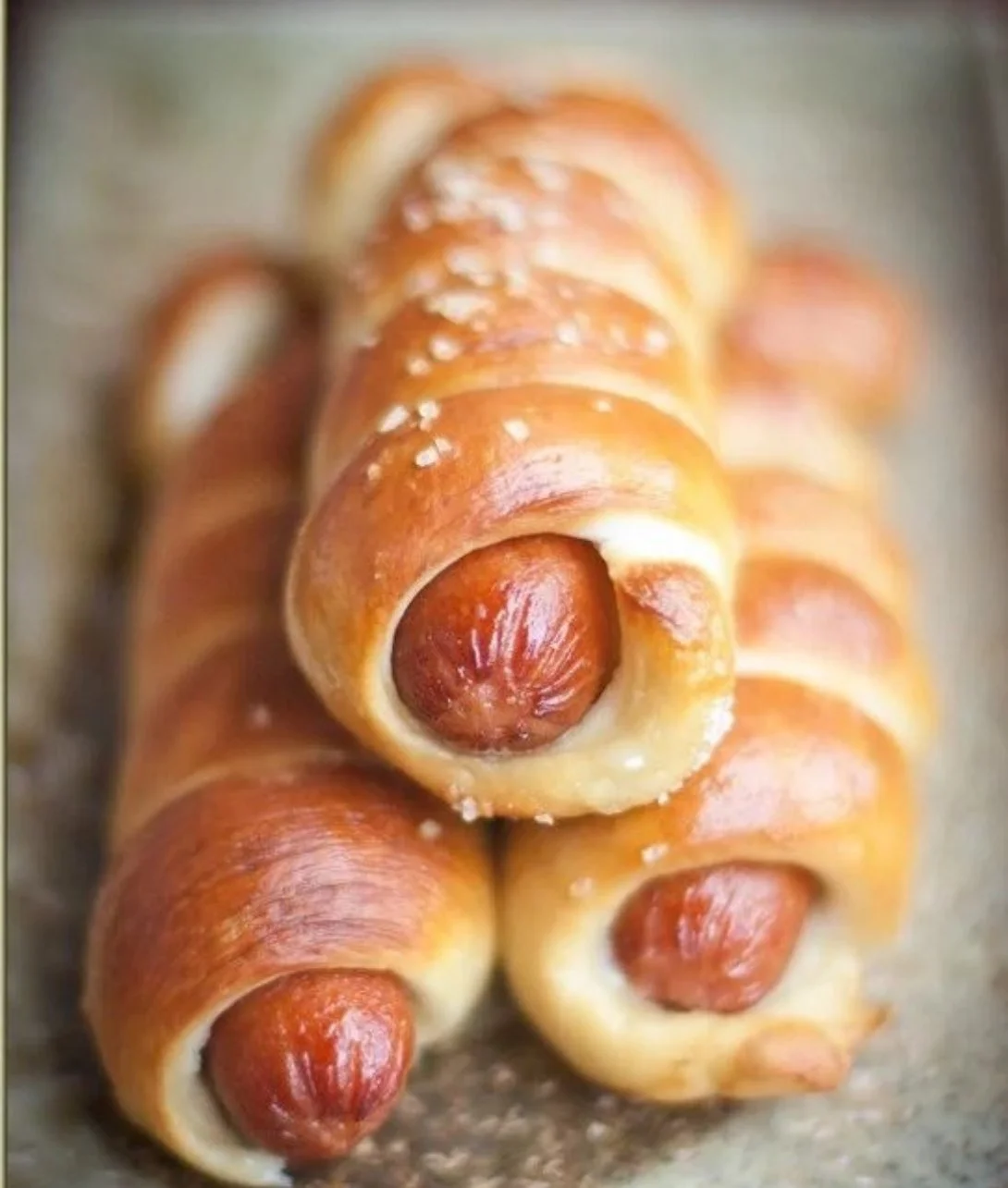 Delicious pretzel dog served with mustard and ketchup