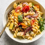 Roasted Veggie Pasta with Feta, featuring colorful vegetables and pasta