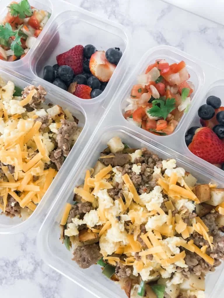 Nutritious breakfast bowl filled with fruits, grains, and toppings.