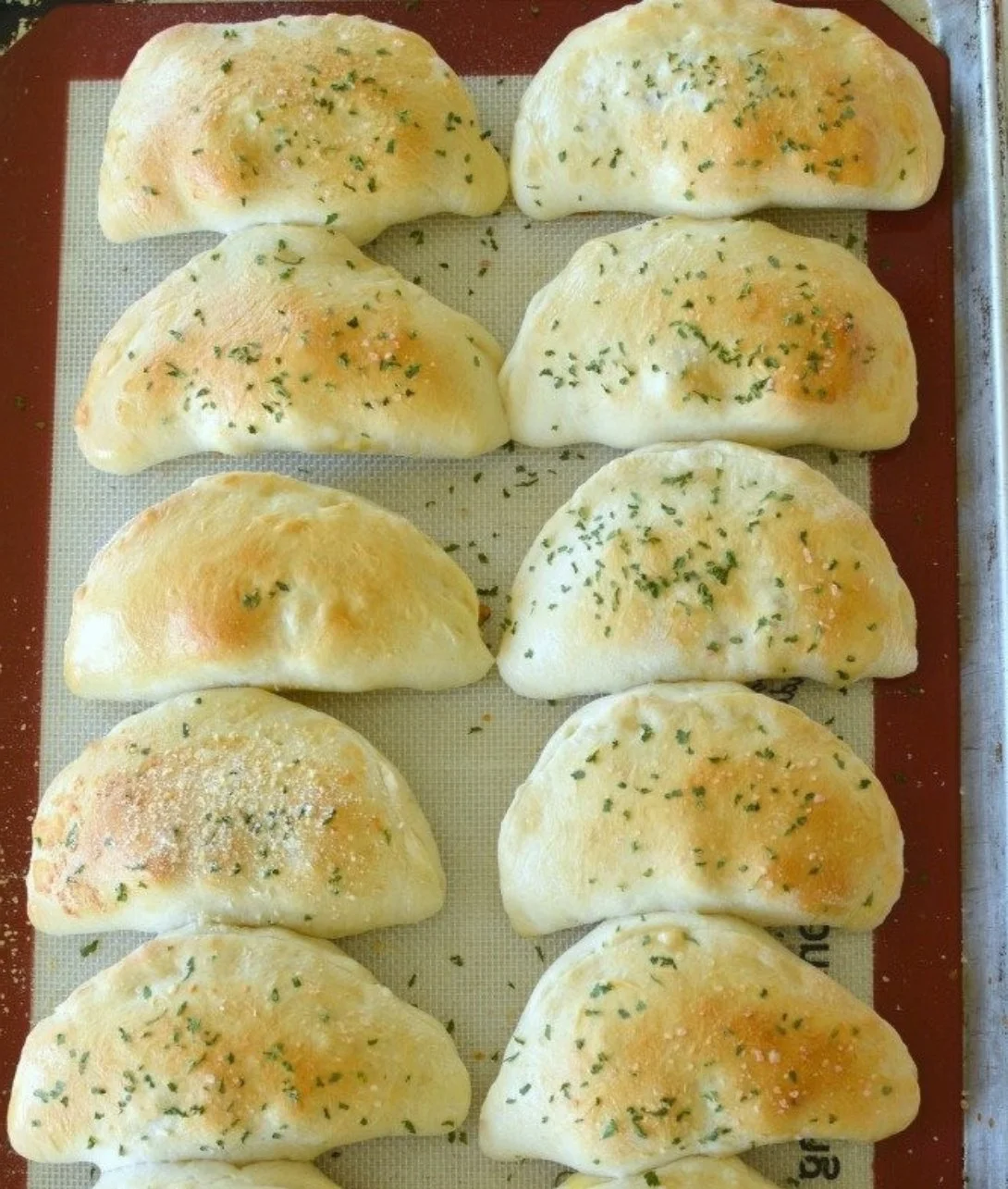 Delicious breakfast ham and cheese calzone fresh out of the oven.
