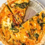 Delicious homemade breakfast quiche with vegetables and cheese