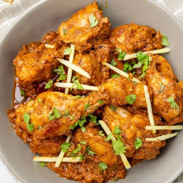 Delicious Chicken Bhuna with spices and herbs served in a traditional dish