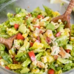 Chicken Salad with Bacon, Avocado, and Lemon Vinaigrette on a plate