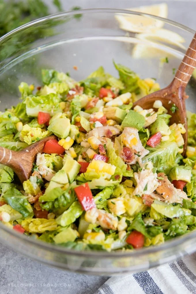 Chicken Salad with Bacon, Avocado, and Lemon Vinaigrette on a plate