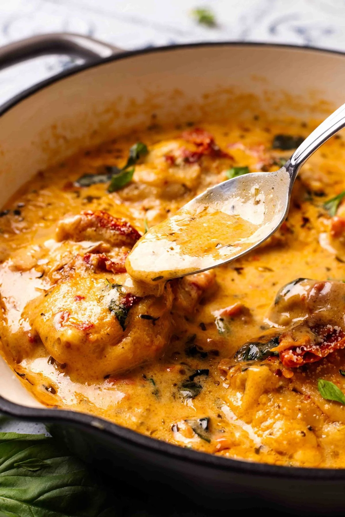 Creamy chicken with sun-dried tomatoes served on a plate