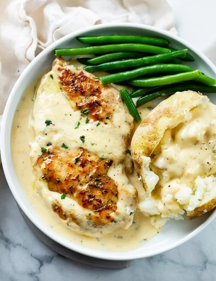 Creamy ranch chicken recipe dish served with sides.