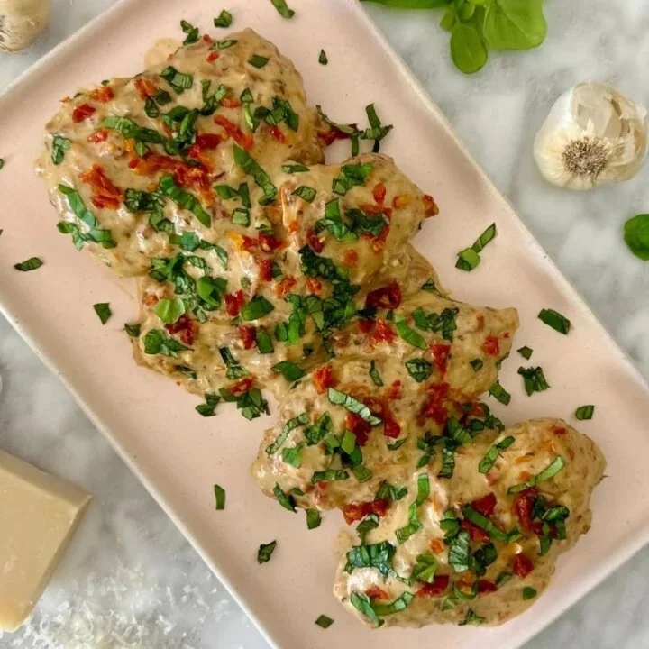 Crockpot Marry Me Chicken dish with creamy sauce and herbs