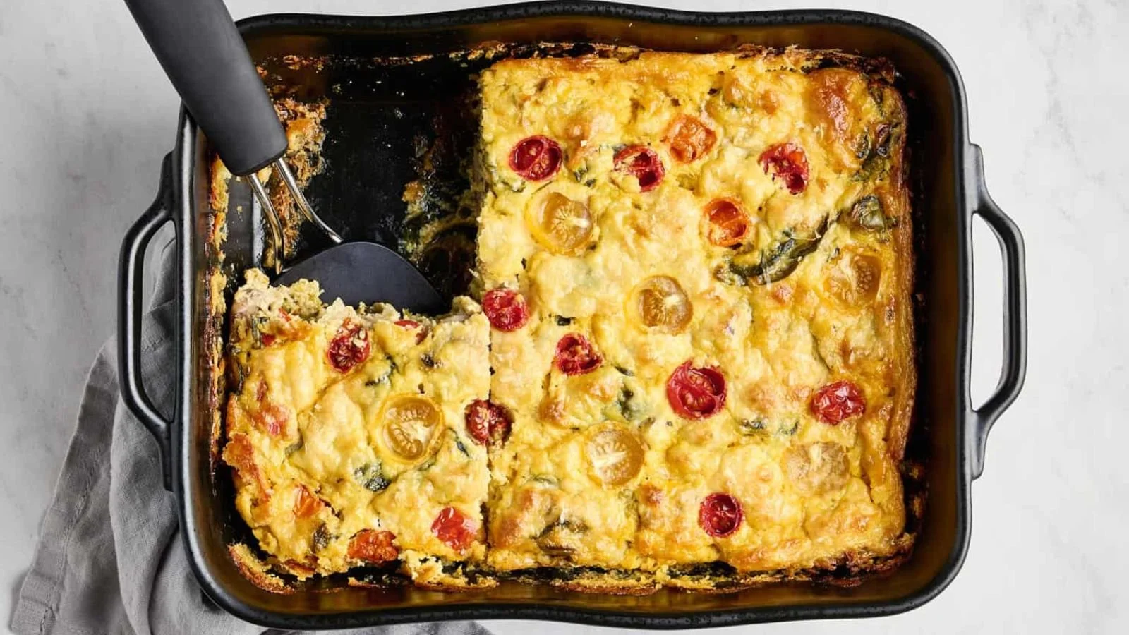 Delicious Easy JUST Egg Frittata topped with colorful vegetables