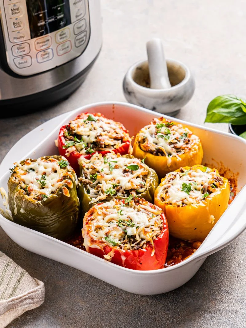 Delicious Instant Pot stuffed bell peppers filled with savory ingredients.