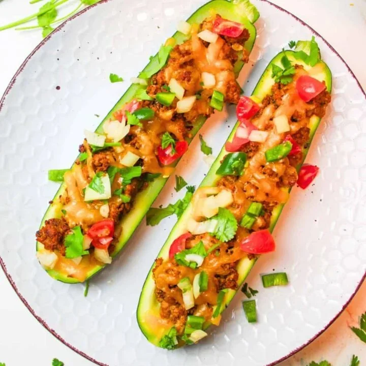 Delicious Instant Pot zucchini boats filled with fresh ingredients.
