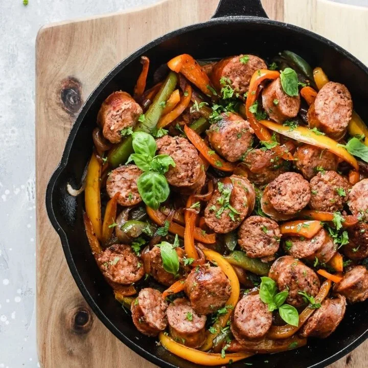 Italian sausage skillet with onions and peppers, a delicious one-pan meal.