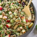 Quinoa apple salad with fresh ingredients in a bowl