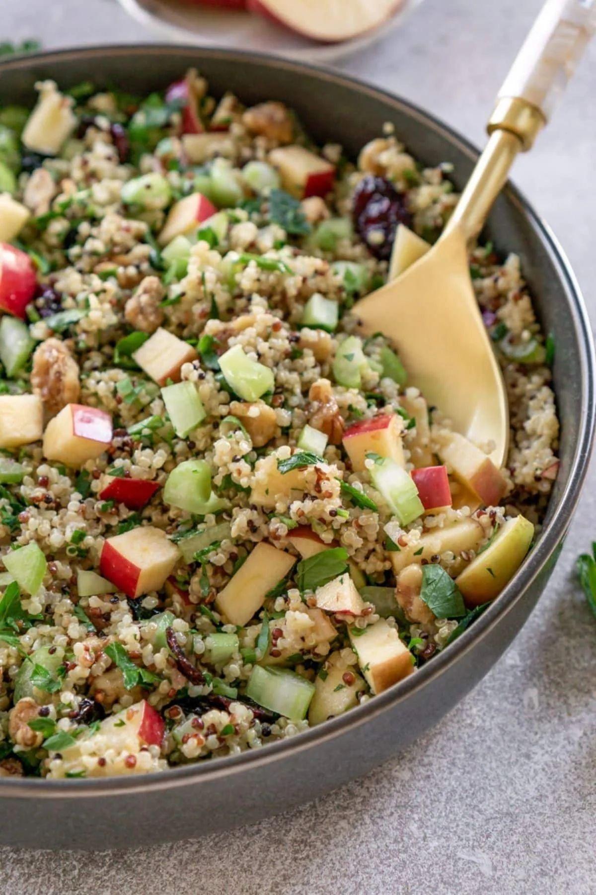 Quinoa apple salad with fresh ingredients in a bowl