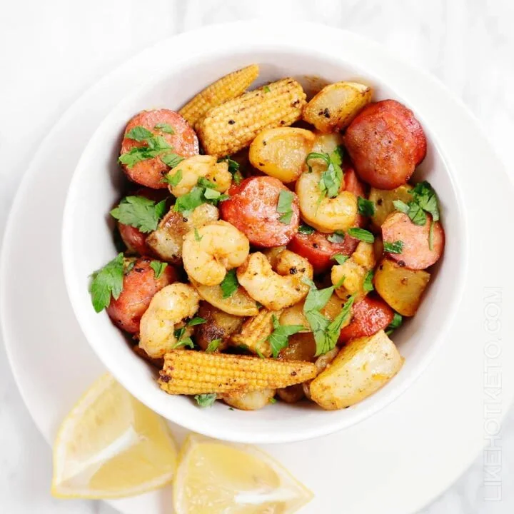 Delicious sheet pan shrimp boil with corn, potatoes, and seasoning