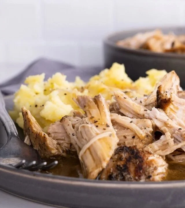 Slow Cooker Pork Loin recipe with herbs and spices in a pot